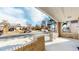 Inviting front porch with decorative brickwork and a view of the neighborhood street at 1621 Trenton St, Denver, CO 80220