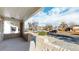 Charming front porch offers a welcoming view of the quiet street and neighborhood at 1621 Trenton St, Denver, CO 80220