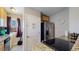 Well-appointed kitchen with stainless steel appliances, stylish granite countertops, and a mosaic backsplash at 1621 Trenton St, Denver, CO 80220