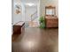 Welcoming entryway with bench seating, decor and hardwood flooring at 9963 W Canyon Ave, Littleton, CO 80127