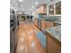Kitchen with stainless appliances, granite countertops and hardwood floors at 9963 W Canyon Ave, Littleton, CO 80127