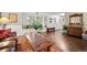 Bright living room with a large window, hardwood floors, and an inviting atmosphere at 9963 W Canyon Ave, Littleton, CO 80127