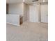 Spacious loft area with neutral carpet, two doors and natural light at 1898 Westport Ave, Berthoud, CO 80513