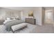 Serene bedroom with a neutral color palette, stylish furniture, and ample natural light at 1898 Westport Ave, Berthoud, CO 80513