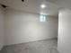 Unfinished basement featuring bare walls and floor, with a small window for natural light at 4159 Wyandot St, Denver, CO 80211