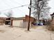 View of the back of the property showing the detached garage and additional storage space, and utilities at 4159 Wyandot St, Denver, CO 80211