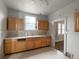 Functional kitchen featuring ample counter space and wood cabinets at 4159 Wyandot St, Denver, CO 80211