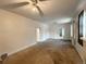 Bright living room featuring a ceiling fan at 4159 Wyandot St, Denver, CO 80211