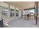 Relaxing back deck features ample space, outdoor seating, and neutral tones throughout at 138 Lullaby Ln, Castle Rock, CO 80109