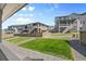 Picture of neighboring backyards all with small lawn areas surrounded by gravel at 138 Lullaby Ln, Castle Rock, CO 80109
