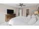 A spacious bedroom with a dresser and private bath at 138 Lullaby Ln, Castle Rock, CO 80109