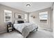Cozy bedroom featuring a neutral color palette, and an area rug under the bed at 138 Lullaby Ln, Castle Rock, CO 80109