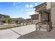 Concrete driveway leading to a home with well-maintained landscaping in a residential neighborhood at 138 Lullaby Ln, Castle Rock, CO 80109