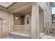 Inviting front porch with classic columns, wood railing, and clear house number display for easy visitor access at 138 Lullaby Ln, Castle Rock, CO 80109