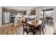 Modern kitchen with stainless steel appliances, white countertops, and a breakfast bar perfect for casual dining at 138 Lullaby Ln, Castle Rock, CO 80109