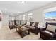 Upstairs sitting area with comfortable leather sofa, chair, and side table at 138 Lullaby Ln, Castle Rock, CO 80109