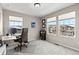 Office featuring a work station, comfortable chair and two windows offering abundant natural light at 138 Lullaby Ln, Castle Rock, CO 80109