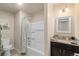 Clean bathroom with a bathtub, shower and granite countertop at 6108 Summit Peak Ct # 102, Erie, CO 80516