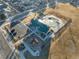 Aerial view of a community park featuring a playground and pavilion at 6108 Summit Peak Ct # 102, Erie, CO 80516