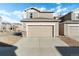 Two-car garage with attached townhome at 6108 Summit Peak Ct # 102, Erie, CO 80516