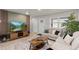 Bright and airy living room showcasing a modern aesthetic at 6108 Summit Peak Ct # 102, Erie, CO 80516