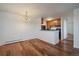 Inviting open floor plan seamlessly connecting the dining and kitchen areas, ideal for entertaining at 5402 Carr St # 307, Arvada, CO 80002