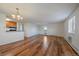 Spacious living room features hardwood floors, natural light, and an open floor plan at 5402 Carr St # 307, Arvada, CO 80002