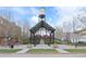 Charming park featuring a covered gazebo, landscaped grounds, and a historic water tower backdrop at 5402 Carr St # 307, Arvada, CO 80002