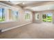 Large basement featuring natural light and access to the outdoors at 7197 Timbers Dr, Evergreen, CO 80439