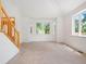 Bright and airy living room with beautiful windows offering lots of natural light at 7197 Timbers Dr, Evergreen, CO 80439