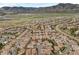Panoramic aerial shot showcases an expansive neighborhood with mountain views at 15156 W Baker Pl, Lakewood, CO 80228