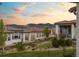 Landscaped backyard with beautiful mountain views and outdoor living spaces, perfect for relaxing at 15156 W Baker Pl, Lakewood, CO 80228