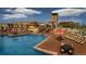Upscale community pool and lounge area perfect for entertaining guests at 15156 W Baker Pl, Lakewood, CO 80228