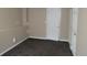 Finished basement with carpet and white trim, offering ample space at 2517 S Genoa St, Aurora, CO 80013