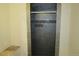 Modern shower stall featuring dark tile and updated fixtures at 2517 S Genoa St, Aurora, CO 80013