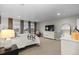 Bright bedroom with plush carpeting and a large window offering serene views at 3636 Sublime Ct, Castle Rock, CO 80108