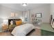 Cozy bedroom with natural light, stylish decor, and comfortable furnishings at 3636 Sublime Ct, Castle Rock, CO 80108