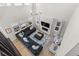Open concept floor plan with high ceilings, comfortable seating, and abundant natural light at 3636 Sublime Ct, Castle Rock, CO 80108