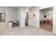 Spacious carpeted playroom area with reading nook, play kitchen, and an open floorplan at 3636 Sublime Ct, Castle Rock, CO 80108