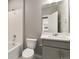 Bathroom featuring a shower-tub combination, toilet and vanity at 27746 E Byers Pl, Aurora, CO 80018