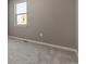 Cozy bedroom with neutral carpeting and a window at 27746 E Byers Pl, Aurora, CO 80018
