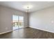 Dining room featuring hardwood floors and sliding glass doors out to the deck at 27746 E Byers Pl, Aurora, CO 80018
