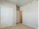 Bedroom with soft carpeting and a double-door closet at 48280 Shetland Dr, Bennett, CO 80102