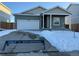 Charming single-Gathering home with a two-car garage and covered porch, perfect for future homeowners in a great neighborhood at 48280 Shetland Dr, Bennett, CO 80102
