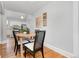 This dining area features a round table with seating for four at 3333 W Hayward Pl, Denver, CO 80211