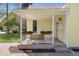 Charming front porch with white railings, decorative planters, and a welcoming entrance to the home at 3333 W Hayward Pl, Denver, CO 80211