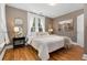 Inviting main bedroom features a large window and decorative accents at 3333 W Hayward Pl, Denver, CO 80211
