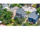 Aerial view of home highlighting the fenced backyard, patio, and surrounding neighborhood at 9758 Red Oakes Dr, Highlands Ranch, CO 80126