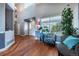 Bright entryway with hardwood floors, high ceilings, and decorative accents at 9758 Red Oakes Dr, Highlands Ranch, CO 80126