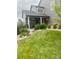 Beautiful front yard with lush green grass and manicured landscaping at 9758 Red Oakes Dr, Highlands Ranch, CO 80126